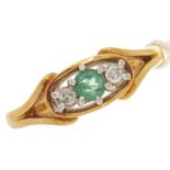 An 18ct gold emerald and diamond ring, 3.5g, size L