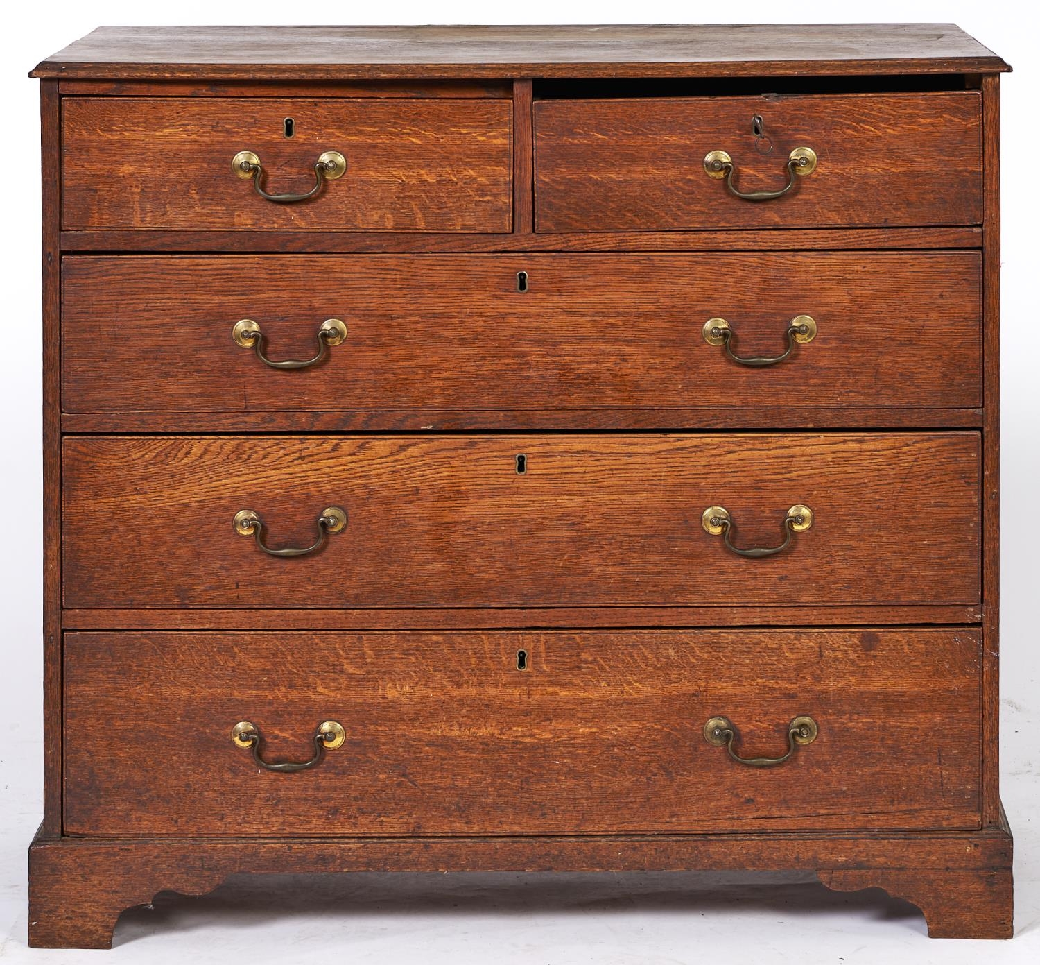 A Victorian oak chest of drawers, on bracket feet, 92cm h; 100 x 51cm Top surface badly stained