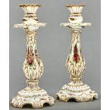 A rare pair of Coalport candlesticks, c1875, painted with flowers and gilt, 25.5cm h, printed