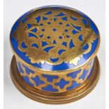 A brass and blue enamel pill box and cover, early 20th c, 41mm diam Good condition