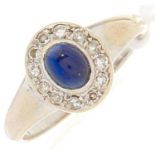 A diamond and cabochon sapphire ring, in white gold, 2.1g, size H