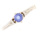 A diamond and tanzanite ring, in white gold marked 14k, 1.9g, size L