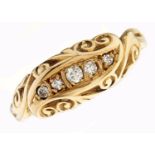 A five stone diamond ring, scroll set in 18ct gold, Birmingham 1918, 3.1g, size N½ Light wear; one