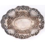 A Victorian die stamped silver bonbon dish, shaped oval with open trellis border, 17cm l, by