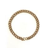 A 15ct gold curb chain, early 20th c, 18.5cm l, links individually marked, 26.2g good condition