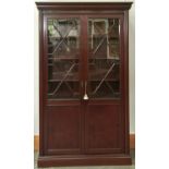 A reproduction mahogany display cabinet in George III style, modern, the ogee moulded cornice