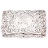 An Edwardian silver snuff box, of scrolling outline with waisted sides and engraved with foliage,