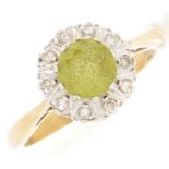 An 18ct gold diamond and peridot ring, 3.9g, size N½