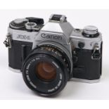 A Canon AE-1 SLR 35mm camera, with Canon FD 50mm F1.8 S.C. Breech Lock lens In apparently working