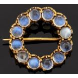 A moonstone brooch, in gold, 2g