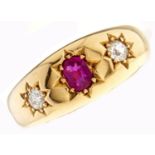 A Victorian three stone ruby and diamond ring, gypsy set in 18ct gold, Chester 1896, 5.6g, size L