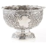 An Edwardian silver rose bowl, die stamped with flowers and scrolls, 17.5cm diam, London 1901, 10ozs