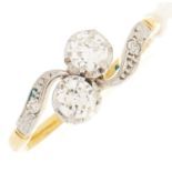 A diamond crossover ring, in gold marked 18ct plat, 9g, size O½