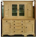 A Victorian painted pine dresser, mid 19th c, with moulded cornice and enclosed by pairs of glazed