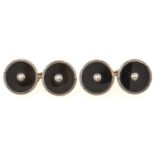 A pair of pearl, black onyx and gold cufflinks, marked 18ct & pt, 9g