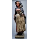 An unusual Northern European cold painted terracotta figure of a woman, probably British, possibly