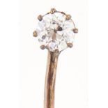 A diamond set 9ct gold stick pin, 1.3g