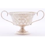 A Victorian two handled pierced silver bonbon dish of vase shape, 14.5cm over handles, marks rubbed,