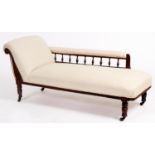 A late Victorian carved mahogany chaise longue, on turned legs and pottery castors, seat height