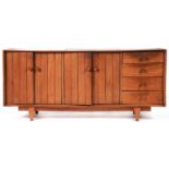 A mid century ash sideboard, c1960, the top with flush lidded central cutlery compartment with brass