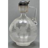 A Victorian silver mounted threaded glass claret jug, of globular form with waisted neck and