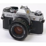A Canon AE-1 SLR 35mm camera, with Canon FD 50mm F1.8 lens In apparently working order, wear