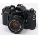 A Canon A-1 SLR 35mm camera, with Canon FD 50mm F1.8 lens In apparently working order, good
