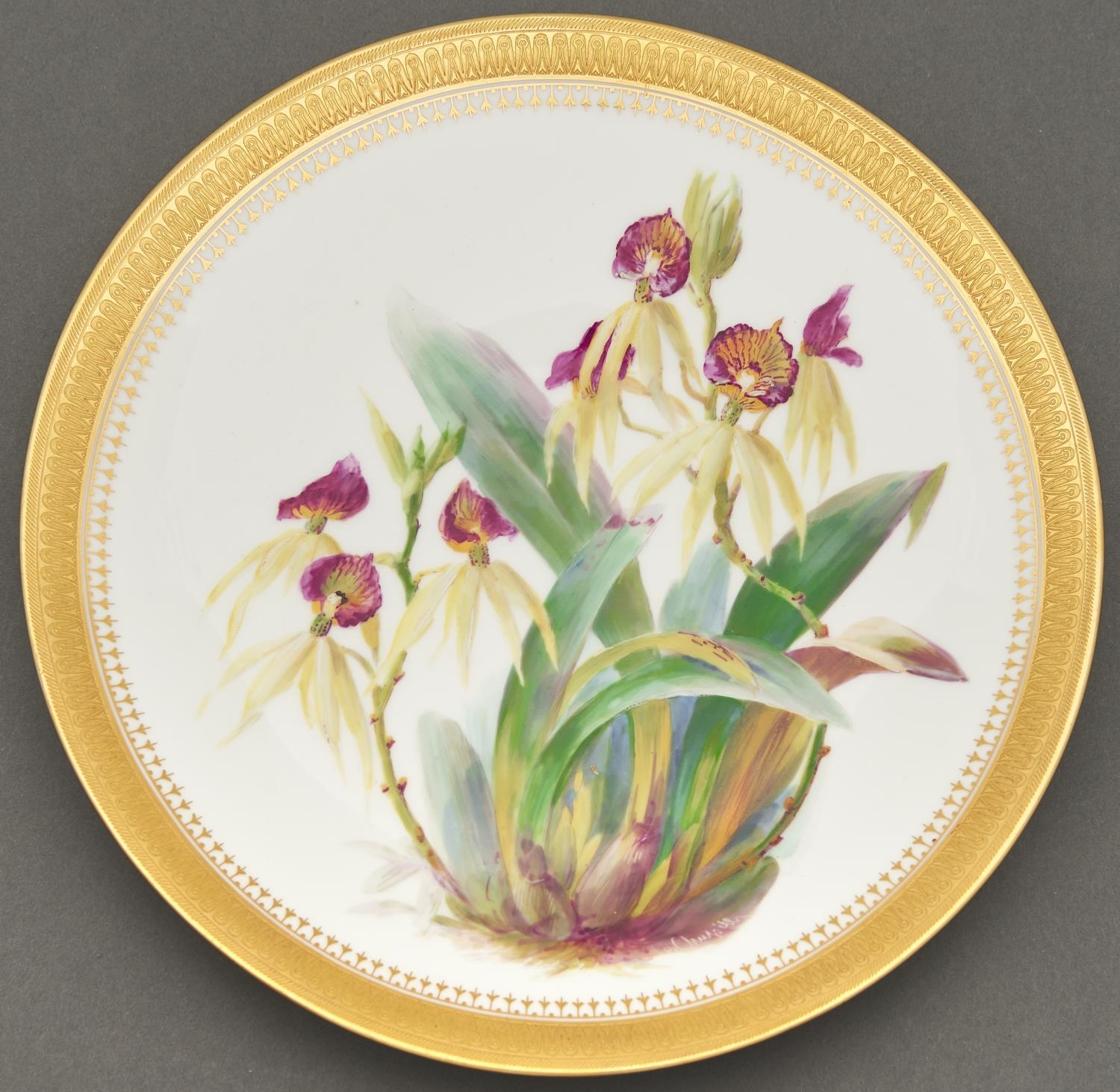A Minton bone china plate, 1879, painted by W Mussill, signed, with orchids, in etched gilt