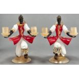 A pair of Venetian black, white and red glass candelabra, mid 20th c, the fanciful figures
