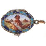 An Egyptian style silver and enamel baby in a basket charm