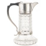 A Victorian silver mounted cut glass claret jug, hob nail cut body, spreading base, by Charles