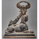 A Victorian cast iron sphinx doorstop, mid 19th c, 24.5cm h Dusty / rusty, originally painted,