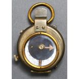 A World War I British prismatic compass, by Ed Koehng 1915, leather case, case dated 1916