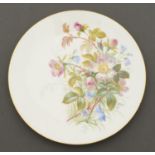 A Cauldon bone china plate, dated 1923, painted by S Pope, signed and dated, with wild flowers in