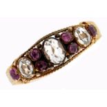 A Victorian amethyst and beryl ring, in 18ct gold, with chased shoulders, indistinctly marked, 2g,