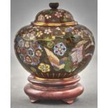A Japanese cloisonné enamel ovoid jar and cover, 20th c, the domed over with kiku knop, decorated