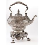 A Victorian silver tea kettle, of pear shape, the domed lid with bud finial and integral hinge,
