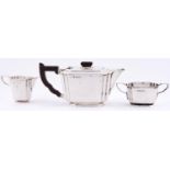An Art Deco silver tea service, the teapot with Bakelite handle and knop, 11cm h, by H C Davis and