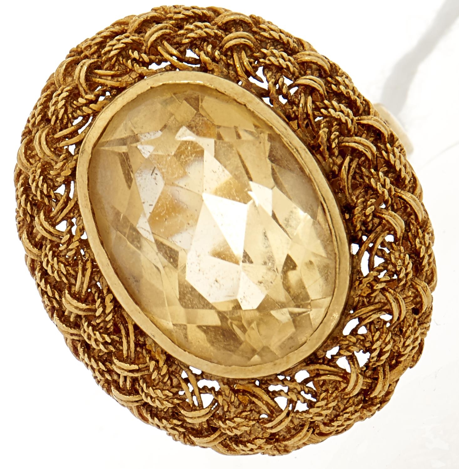 A citrine ring, in gold marked 18k, 7.5g, size J