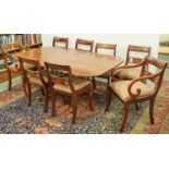 A Victorian mahogany and line inlaid oblong tilt top dining table, crossbanded in rosewood, on