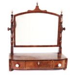 A George III line inlaid mahogany dressing mirror, with turned uprights and ivory handles, 52cm w