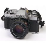 A Minolta X-300 SLR 35mm camera, with Minolta MD 50mm F1.7 lens, Minolta case In apparently