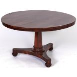 A William IV rosewood breakfast table, the round top on tapered octagonal pillar, platform and