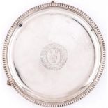 A Victorian silver waiter, with plain cavetto and beaded rim, the field engraved with armorials