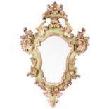 An Italian giltwood and pea green painted mirror, early 20th c, in baroque style, 89cm h Wormed in