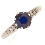 A sapphire and diamond ring, in white gold marked 18ct plat, 2.8g, size M½