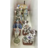 A Royal Doulton bone china figure of Taking Things Easy, c1974, 17cm h, three Lladro figures, etc