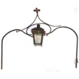 Architectural Antiques. An English wrought iron  overthrow, 19th c, with square lantern aperture,