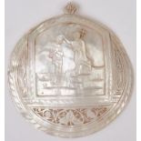 A carved mother of pearl baptismal shell, late 19th c, 13.5 x 15cm Good condition
