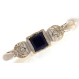 An 18ct gold sapphire and diamond ring, 2.9g, size L